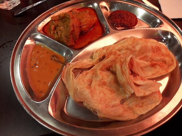 Roti canai with curry